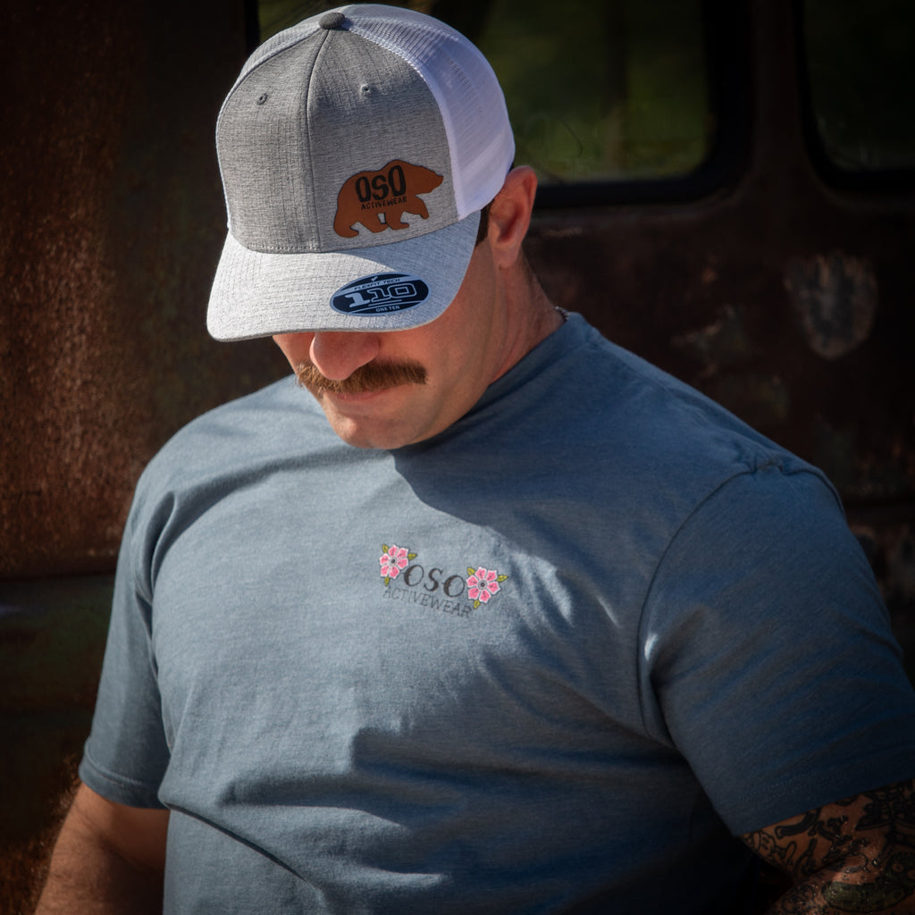 Melange Silver / White Flexfit Trucker Hat - Leatherette Bear Logo Patch