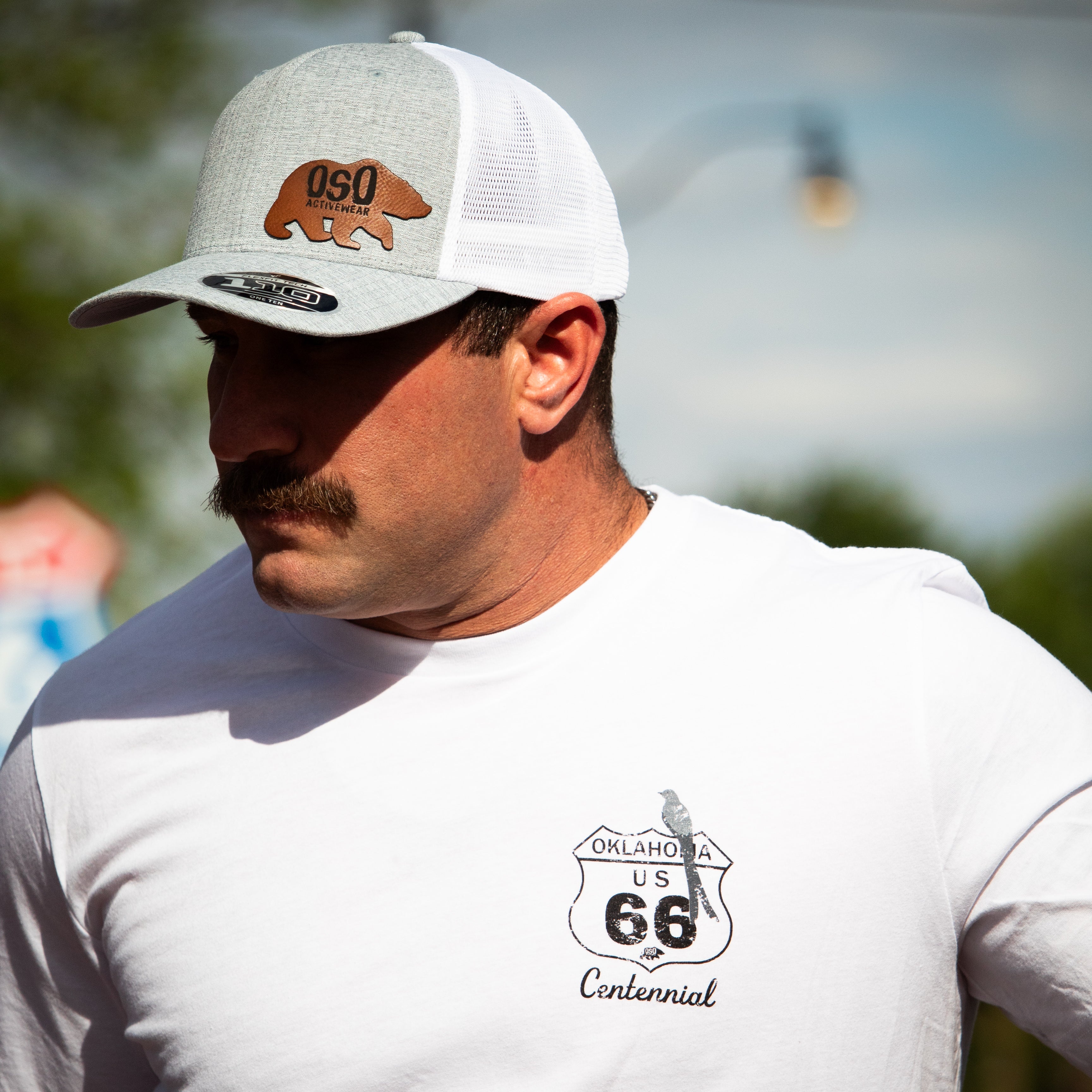 Melange Silver / White Flexfit Trucker Hat - Leatherette Bear Logo Patch