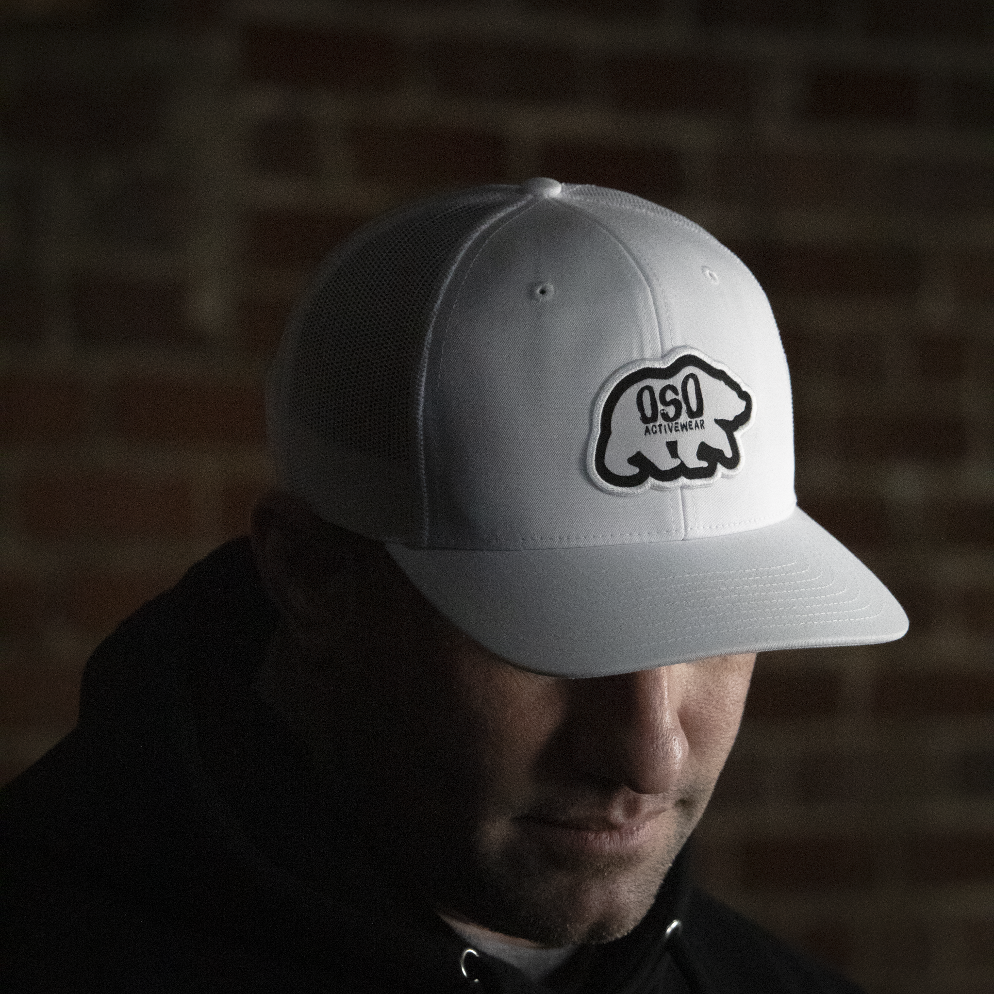 White Logo Trucker Snapback Hat