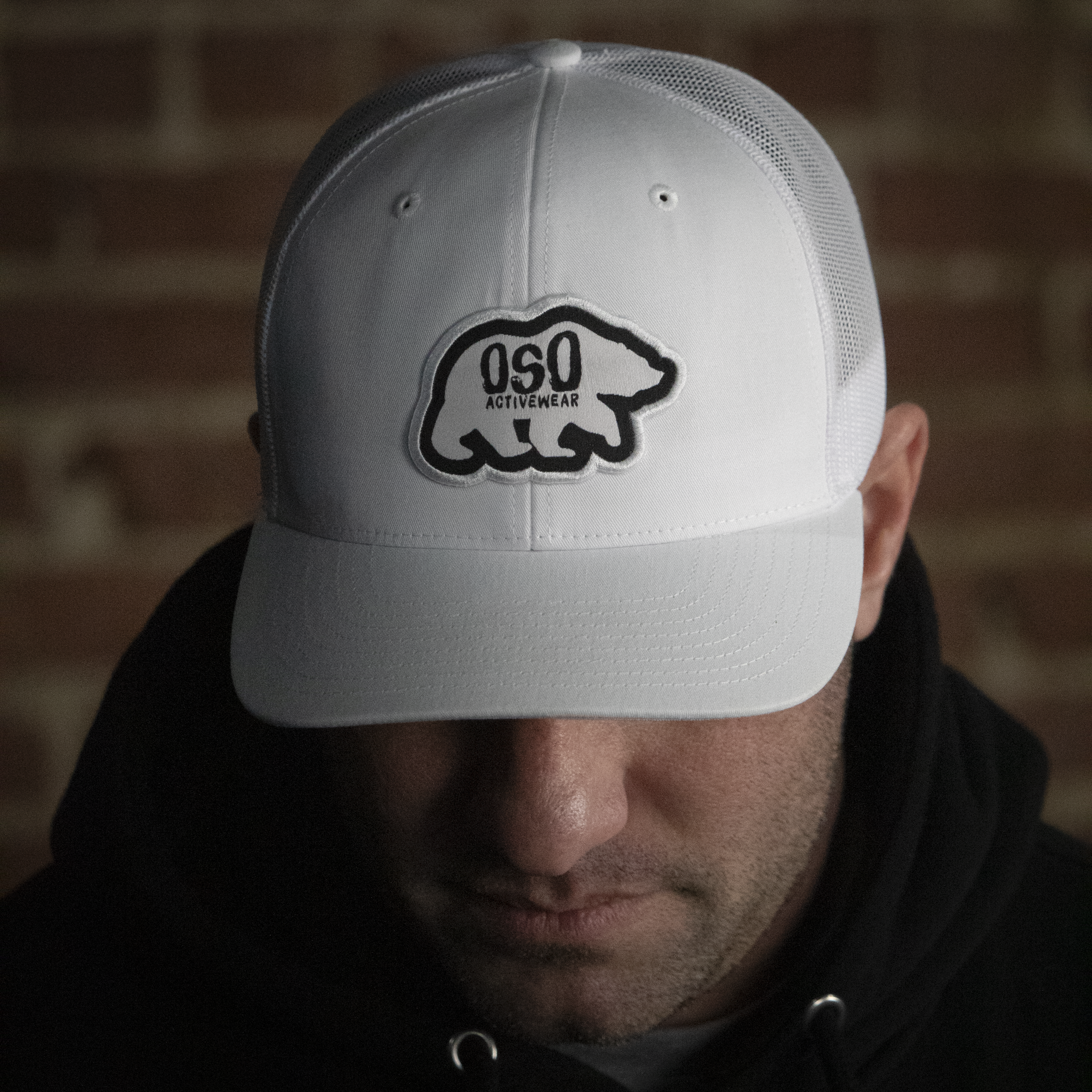 White Logo Trucker Snapback Hat